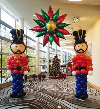 These six foot tall balloon sculpture Nutcrackers are an excellent area decoration communicating an old-fashioned Christmas event theme when placed around a venue. 