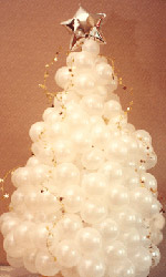 These snow tree balloon sculpture of snowball-sized white balloons can be made to a variety of heights and will be adorned with decoration balloon balls in colors that fit your theme. 