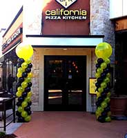 twin balloon columns flanking the entrance to California Pizza Kitchen for a promotion event