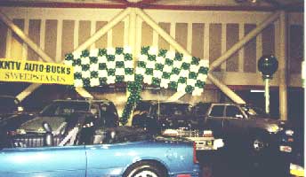 Checkered flag backdrop for meeting at the San Jose Convention Center