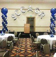 Columns & mylar sign for organization meeting