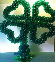 Balloon sculpture of a four leaf clover used as decoration for meeting