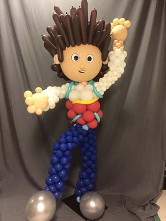 A 4' balloon sculpture of a boy with his 