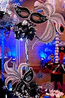 Table centerpiece of carnival / casino style decorative masks