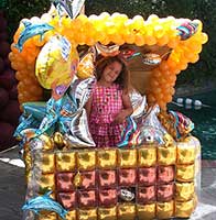 Balloon sculpture of a giant treasure chest to accent tales of pirates and bounty