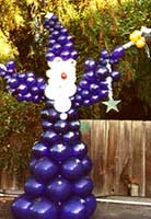Balloon sculpture of a giant wizzard supports many tales of magic and mystery