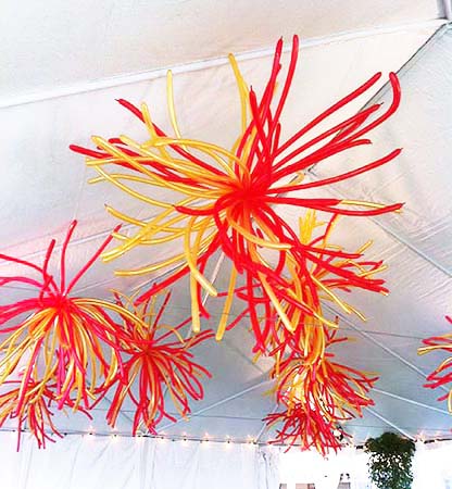 Red and gold fireburst cluster ceiling decoration