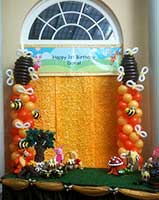 Custom designed beehive balloon columns for a childrens' event