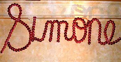 Script style name sign created with minitaure mylar heart balloons
