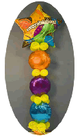 A bouquet of three Mylar® sphere-shaped balloons arrqnged vertically separated by latex collar balloons topped by a multi-colored giant thirty inch Mylar® star balloon with the inscription 'Congratulations' 