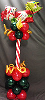 This 24 inch tall centerpiece is made of holiday color latex balloons topped by 'gift package' balloons.