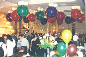 Exploding style balloon drop using 30 inch jewel color balloons