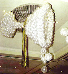 This six foot tall champange glass of clear and silver balloons is a great focal decoration for New Year's celebrations